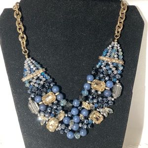Beautiful 5 strand, crystal, rhinestone and bead necklace.